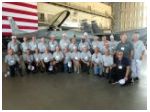 70-01 50 Yr Reunion - 0022 - Eglin Tour - Class Photo in King Hangar.jpg